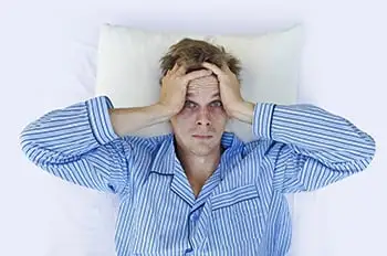 A person having trouble sleeping.